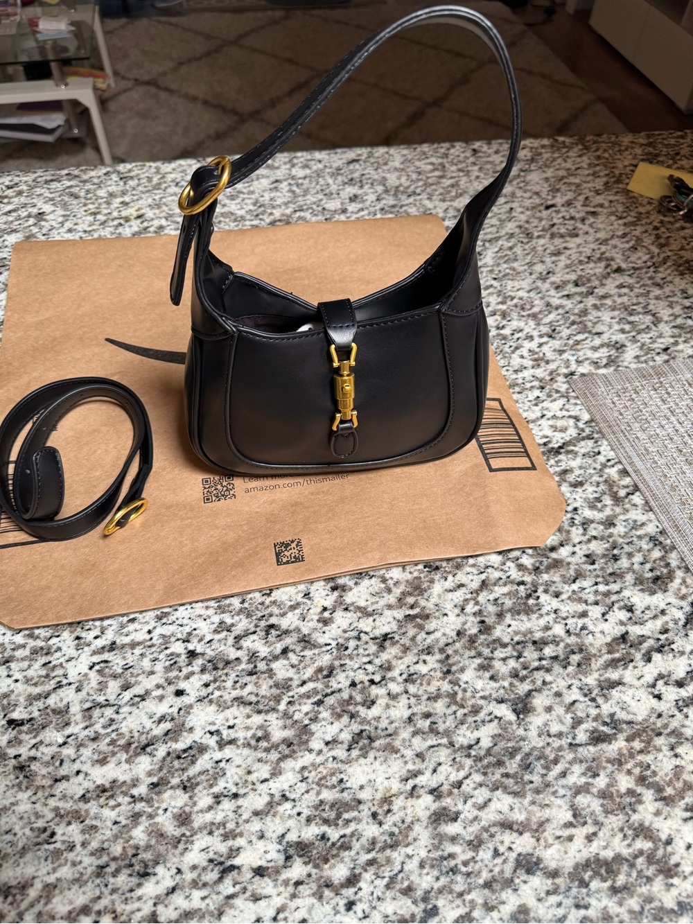 Black Leather Shoulder Bag with Gold Hardware